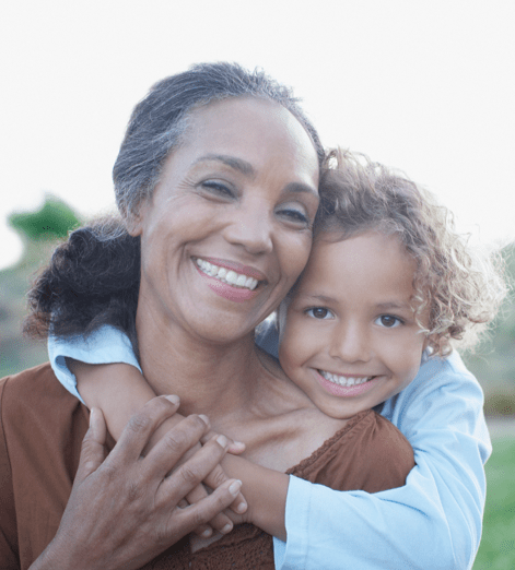 Child hugging a grandparent