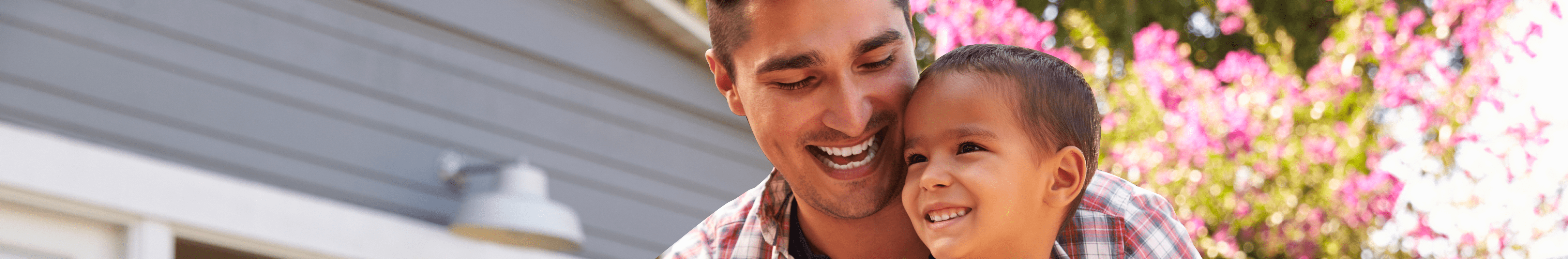 Smiling father and son