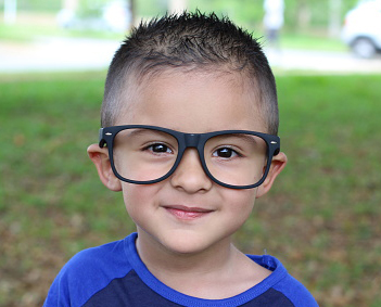Young boy in glasses